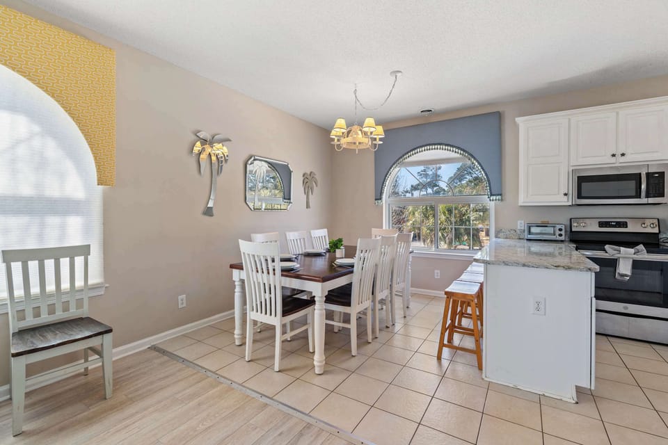 Dining nook with arched windows & lots of natural light