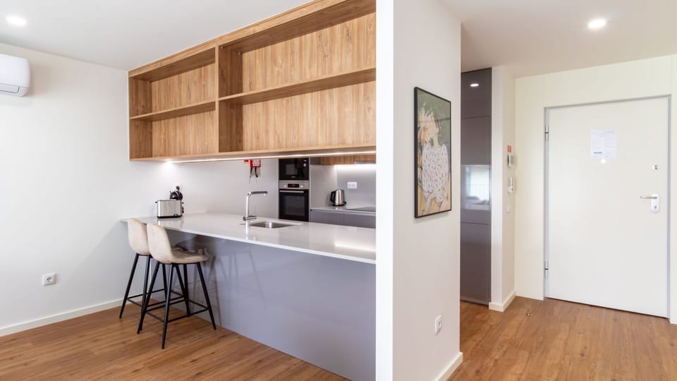 Navigate with ease through this well-designed apartment, where the layout effortlessly connects the sleeping and bathing areas, offering a sense of privacy and convenience for all guests. The contemporary design ensures a seamless flow throughout your sta