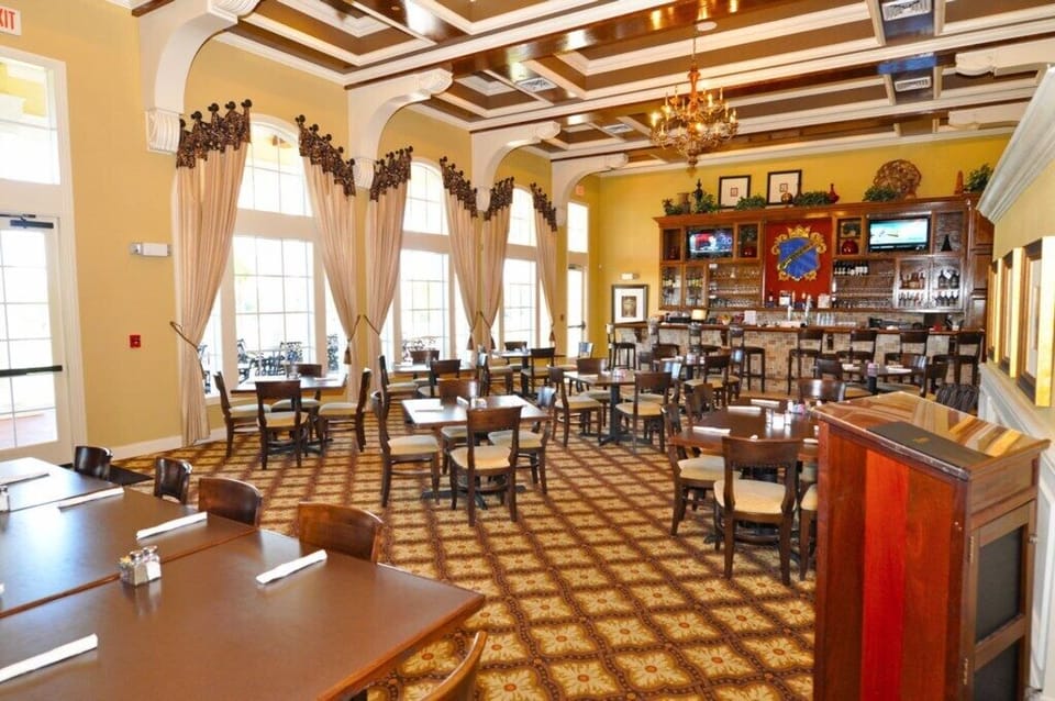 PROVIDENCE:  Elegant community dining area with high ceilings and comfortable seating.