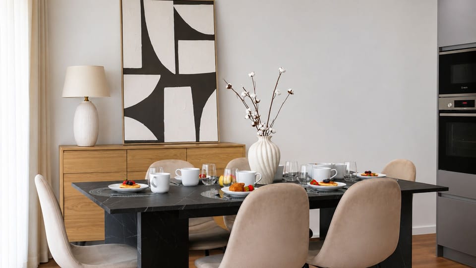 Discover the convenience of in-apartment laundry facilities tucked neatly away, ensuring you have fresh clothes throughout your stay without a trip to a laundromat. This practical space also features a hot water heater, promising comfortable showers and a