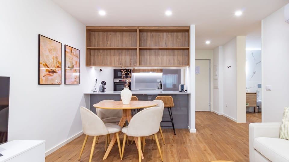Enjoy a bright and airy living space, comfortably furnished and bathed in natural light, seamlessly connected to the inviting private bedroom for ultimate relaxation. #LivingSpace #BedroomAccess #NaturalLight #ElegantInteriors #RelaxationHub