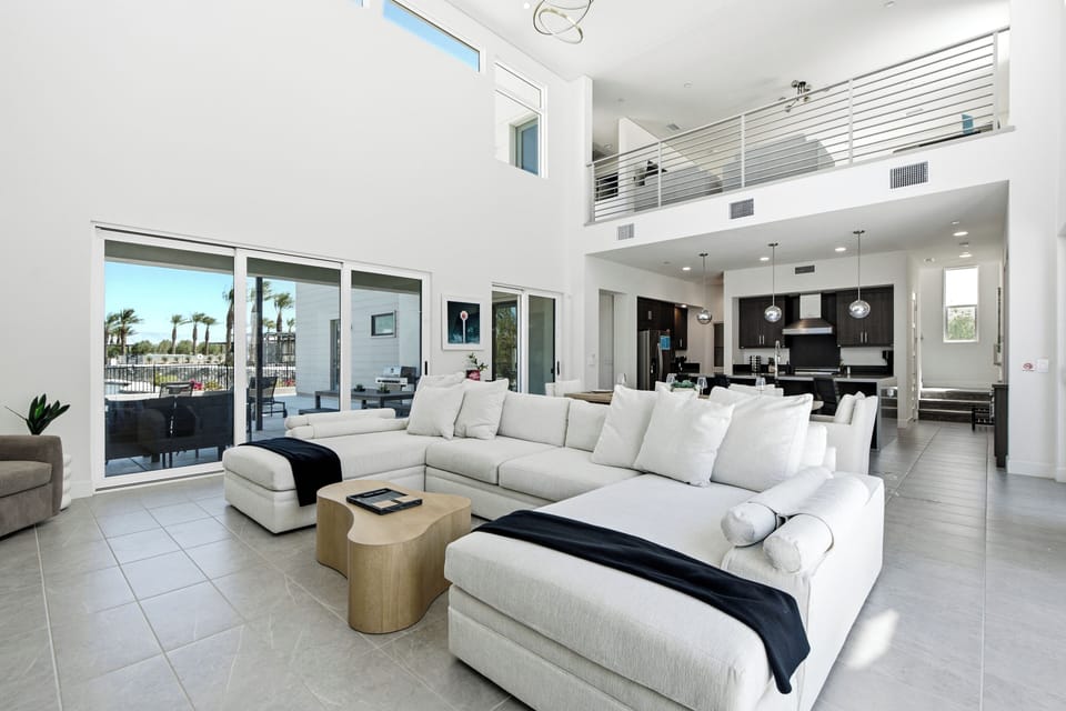 Oversized sectional, 98" Smart TV, smart lighting & A/C for ultimate comfort.