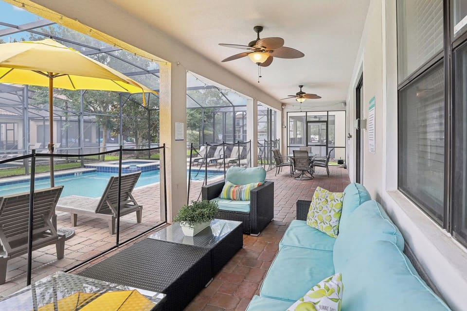 Outdoor covered patio with furnished seating area