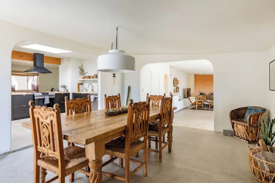 The whole floor plan in one frame — kitchen left, living room straight ahead.