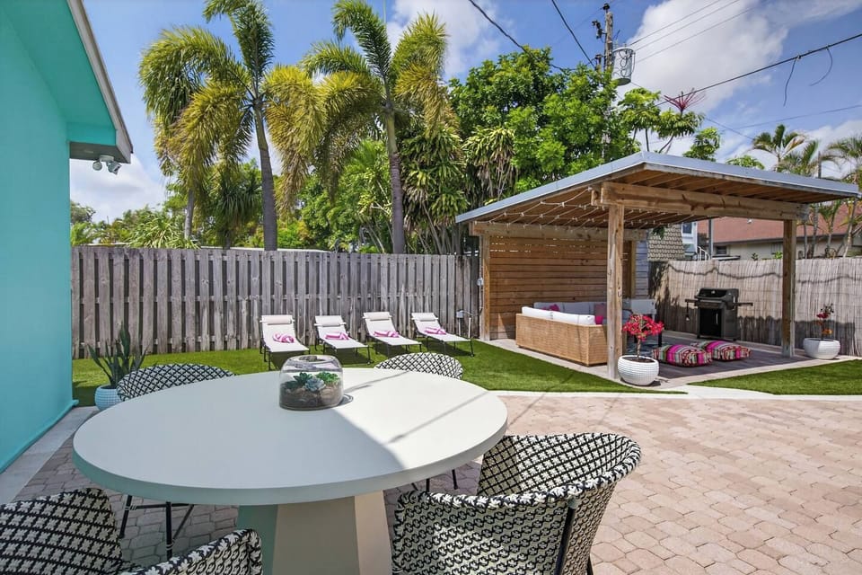 Outdoor oasis. Pool, Furnished Cabana, Weber Grill, Turf, Outdoor Shower, Loungers, Dining table and more