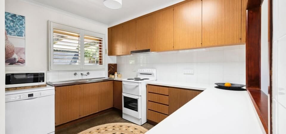 Functional kitchen with ample bench space.