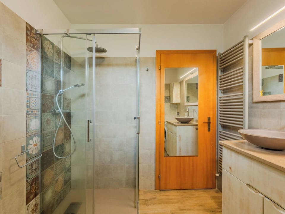 Flooring, Plumbing Fixture, Interior Design, Bathroom, Floor, Bathroom Sink, Ceiling, Plumbing, Shower, Lighting