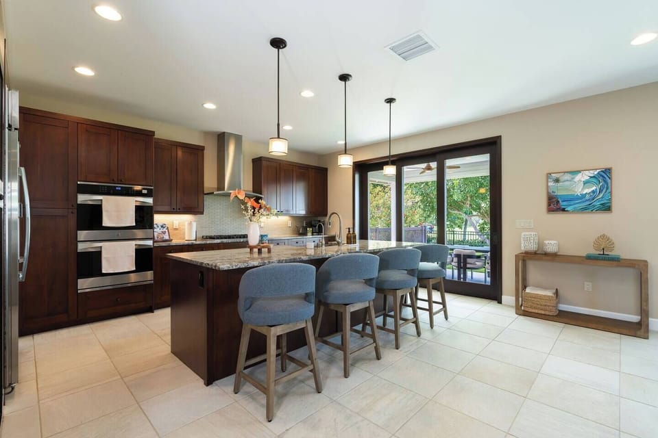 A spacious chef’s kitchen with room to gather and connect