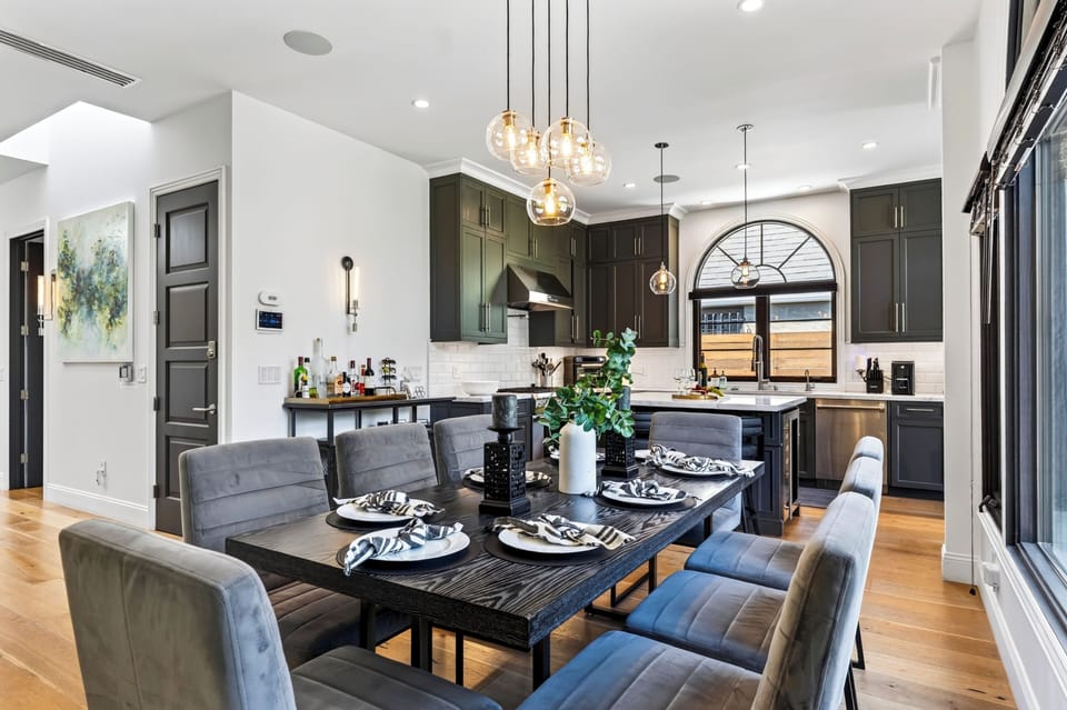 Alternate angle of the dining space seamlessly connected to the kitchen.
