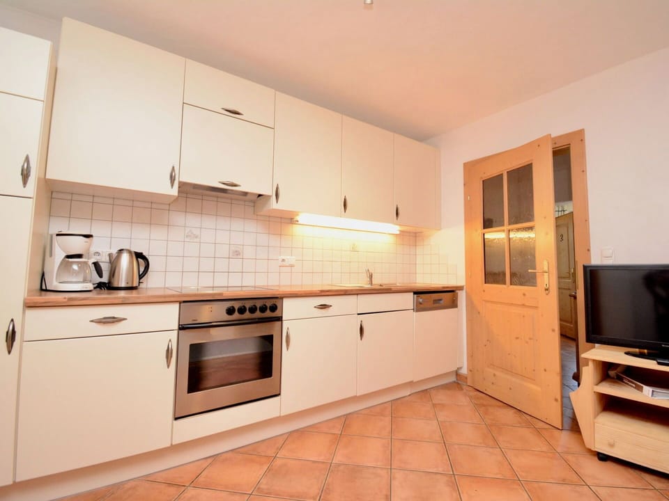 Cabinetry, Kitchen, Flooring, Wood, Interior Design, Countertop, Kitchen Appliance, Floor, Furniture, Major Appliance