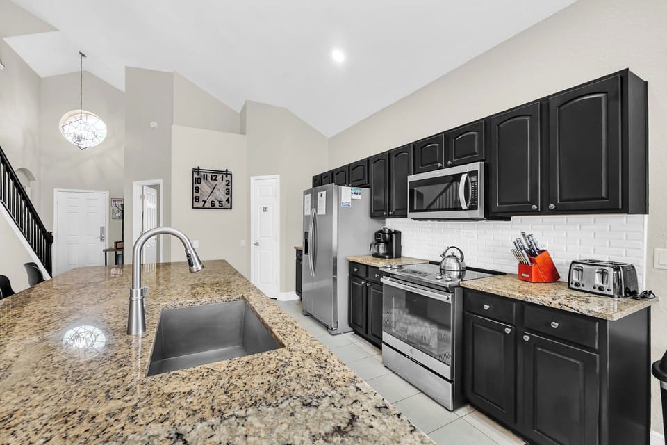 Stove, Oven, Refrigerator/Freezer, Microwave, And Coffee Maker - All Supplied For Your Use