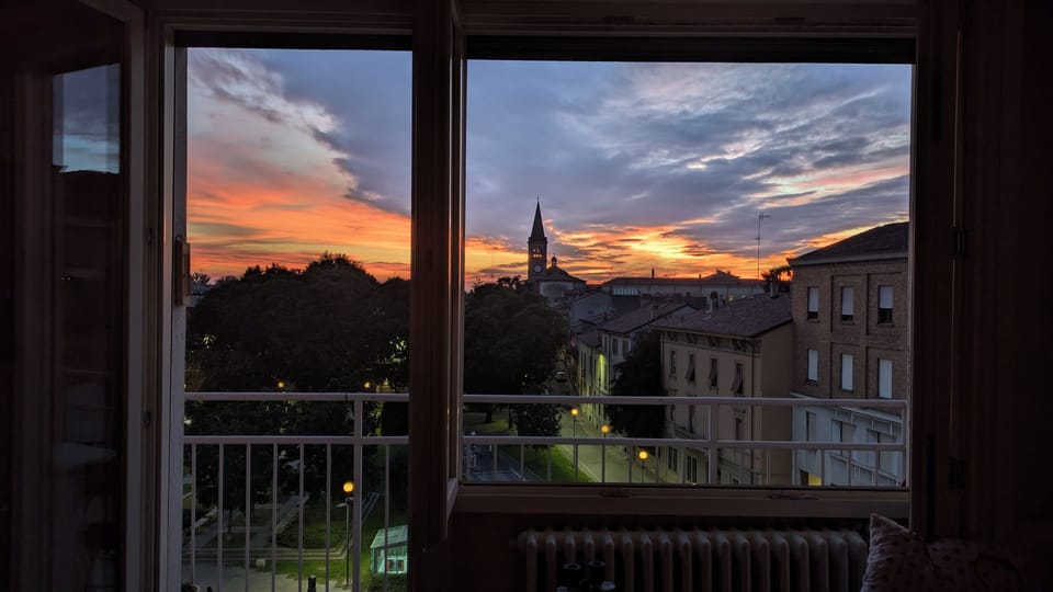 Sunset over Piazza Marconi. 