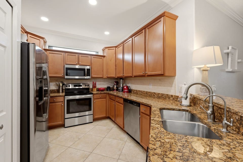 Deep sink and easy-reach storage make cleanup simple.