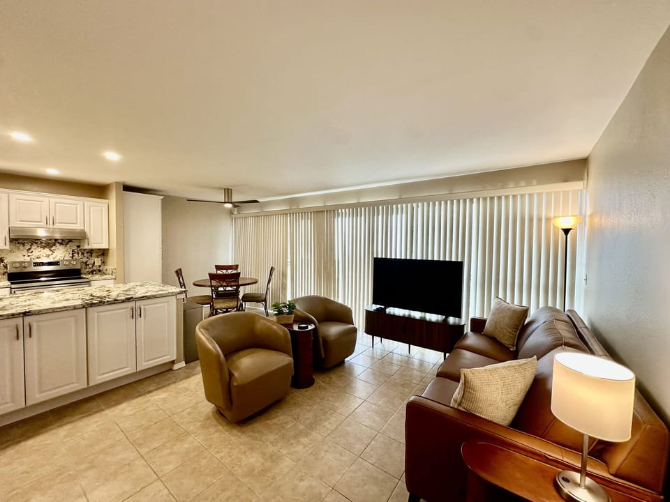 Living room, dining room & kitchen.