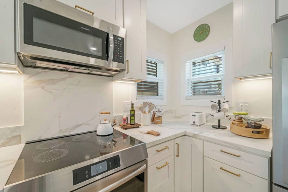 Quick-cooking induction stove and oven.  Pour-over coffee maker and coffee provided.  

The kitchen is fully stocked with all cooking utensils, cookware, and bakeware.