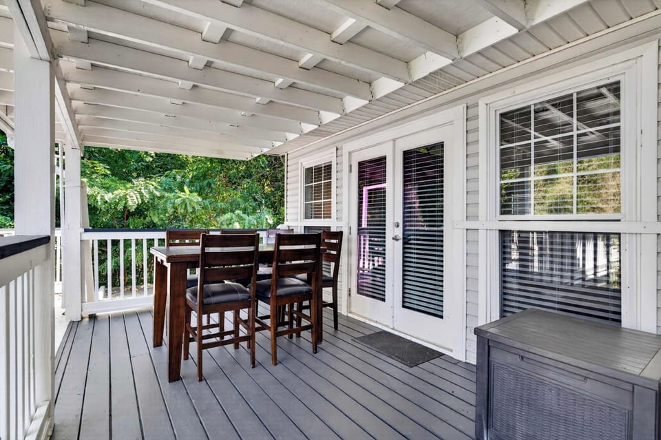 Deck: Scenic waterfront deck with a peaceful atmosphere and beautiful water views, creating a great spot to gather, relax, and enjoy the outdoors throughout your stay.