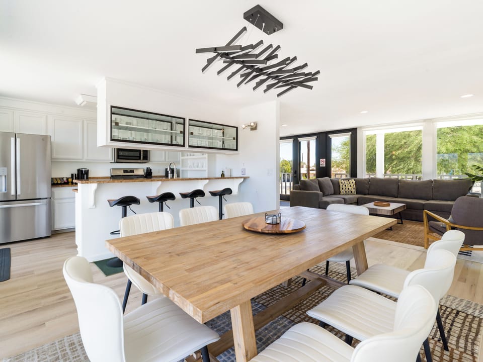 Open layout featuring the dining area, living room, and kitchen