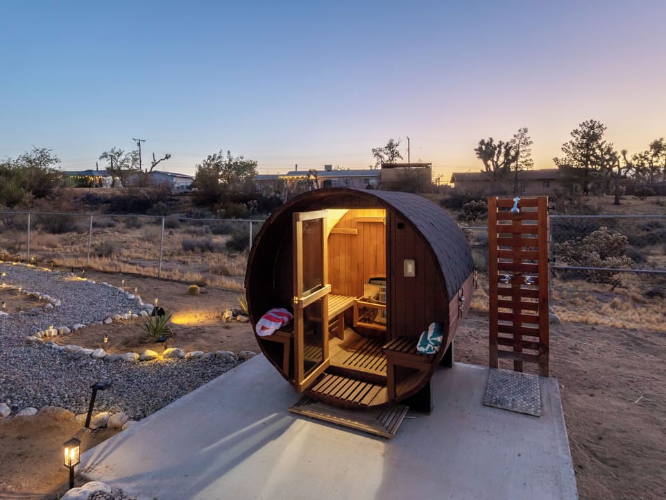 Two-person sauna, right next to an outdoor shower!
