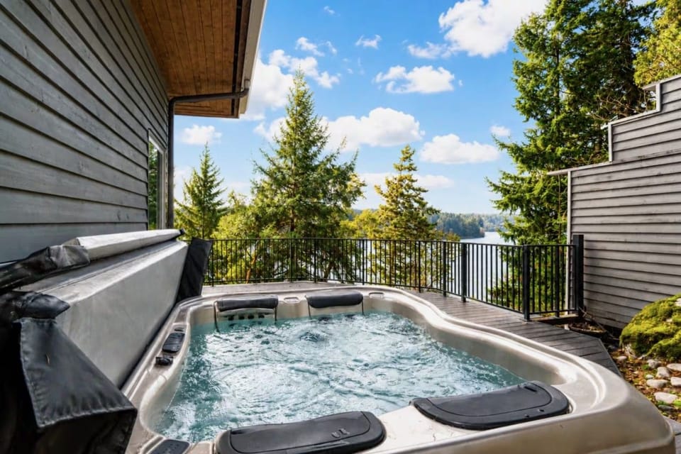 End every day with a soak overlooking the water, surrounded by towering evergreens and the quiet beauty of the Pacific Northwest