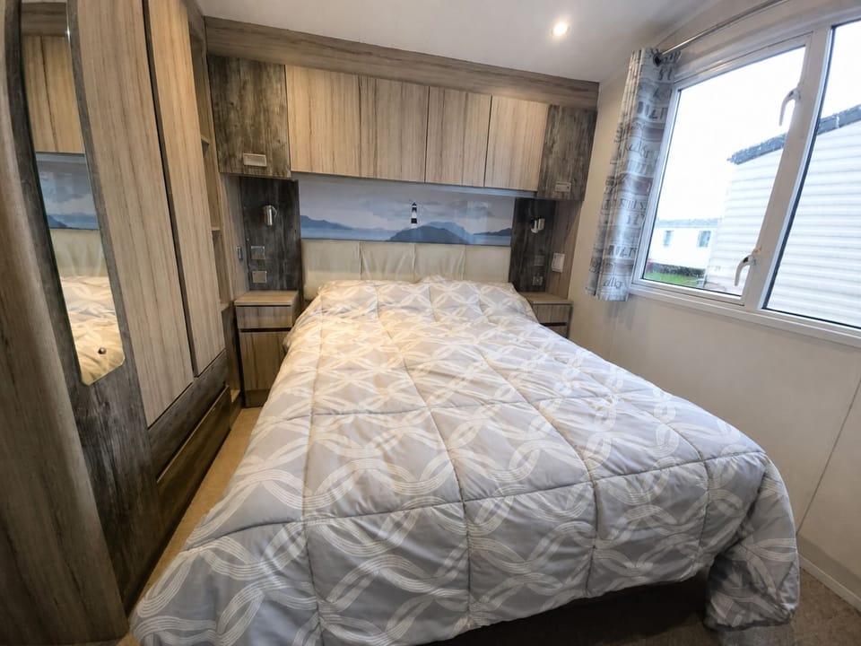 Bright double bedroom at The Retreat Lighthouse, Lido Beach, Prestatyn