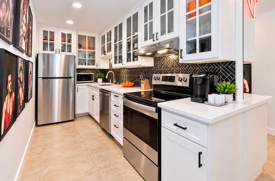 Sleek white cabinets with stainless steel appliances