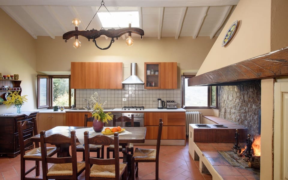 Furniture, Interior Design, Kitchen, Flooring, Countertop, Wood, Ceiling, Cabinetry, Light Fixture, Floor