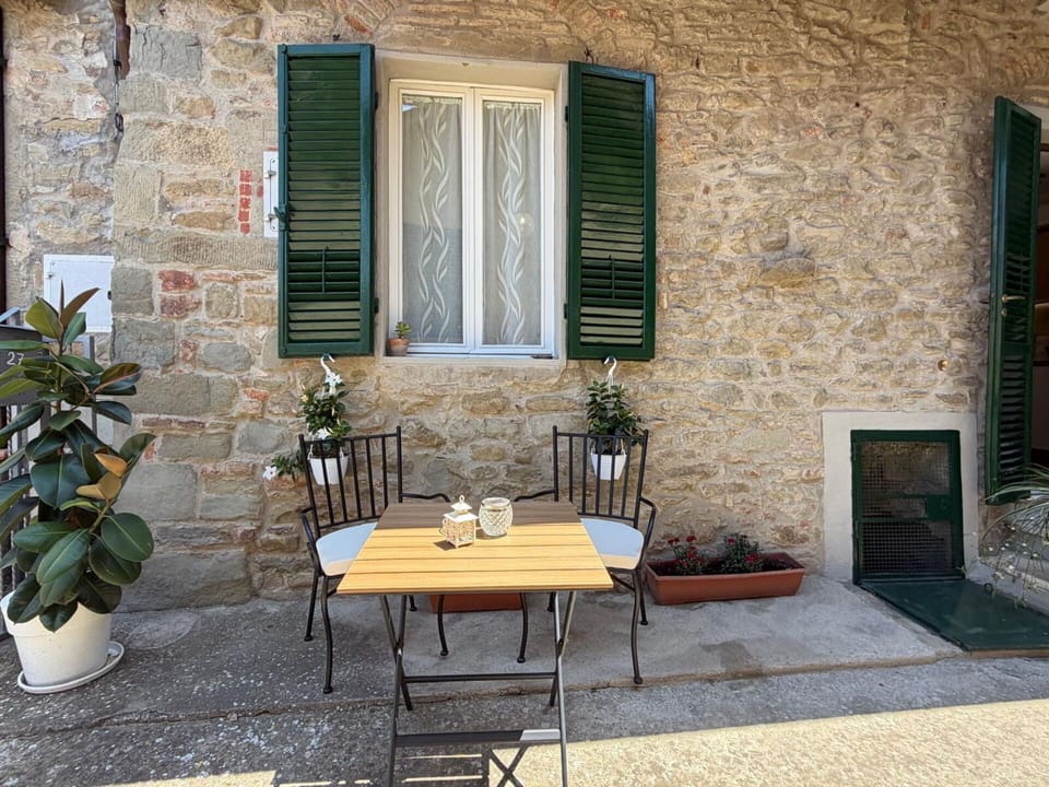 Wall, Flowerpot, Furniture, Outdoor Furniture, Houseplant, Outdoor Table, Chair, Door, Brick, Wood Stain