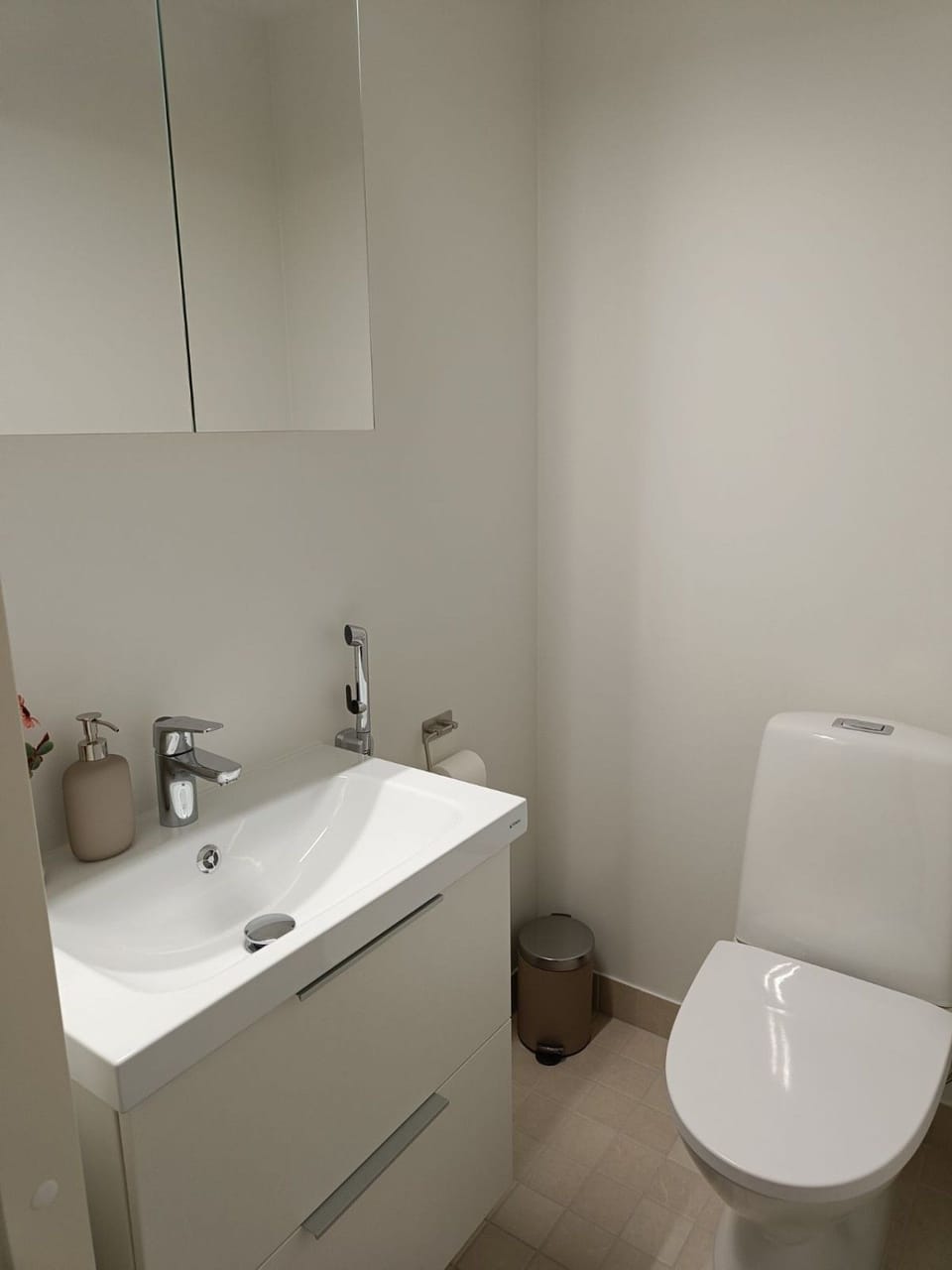 a separate half-bath (WC) for added convenience.