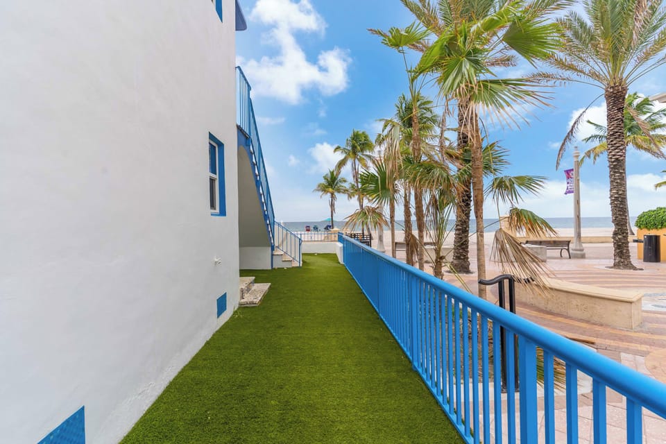 Lounge the day away or dine alfresco with ocean views in the shared yard​