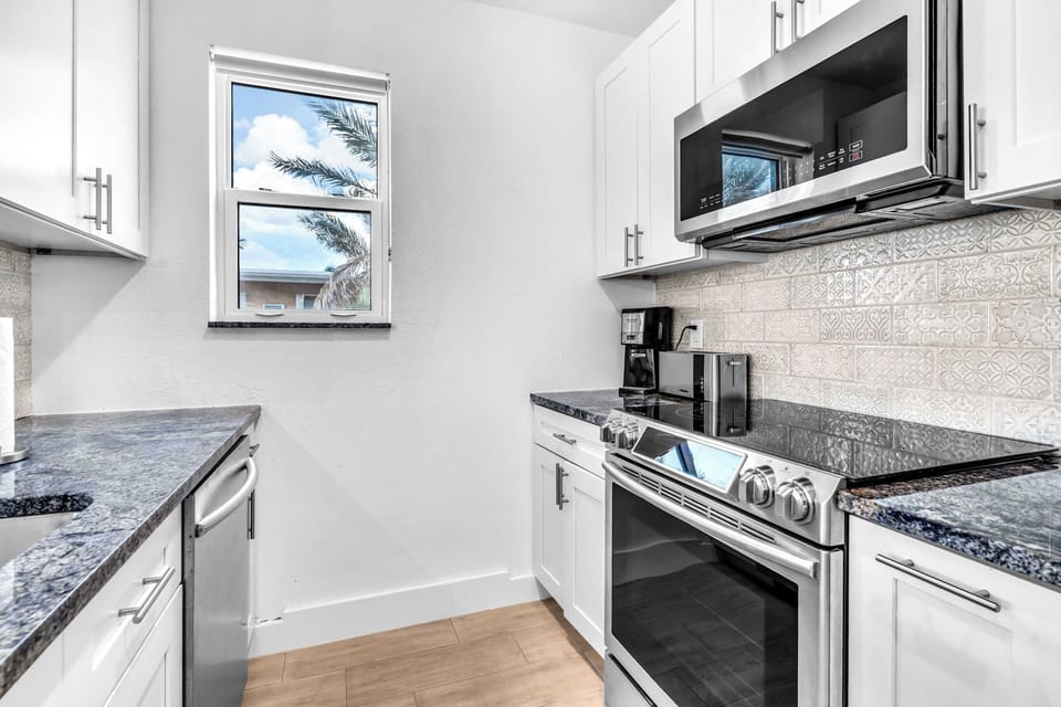 The airy, open kitchen offers ample space & all the comforts of home​