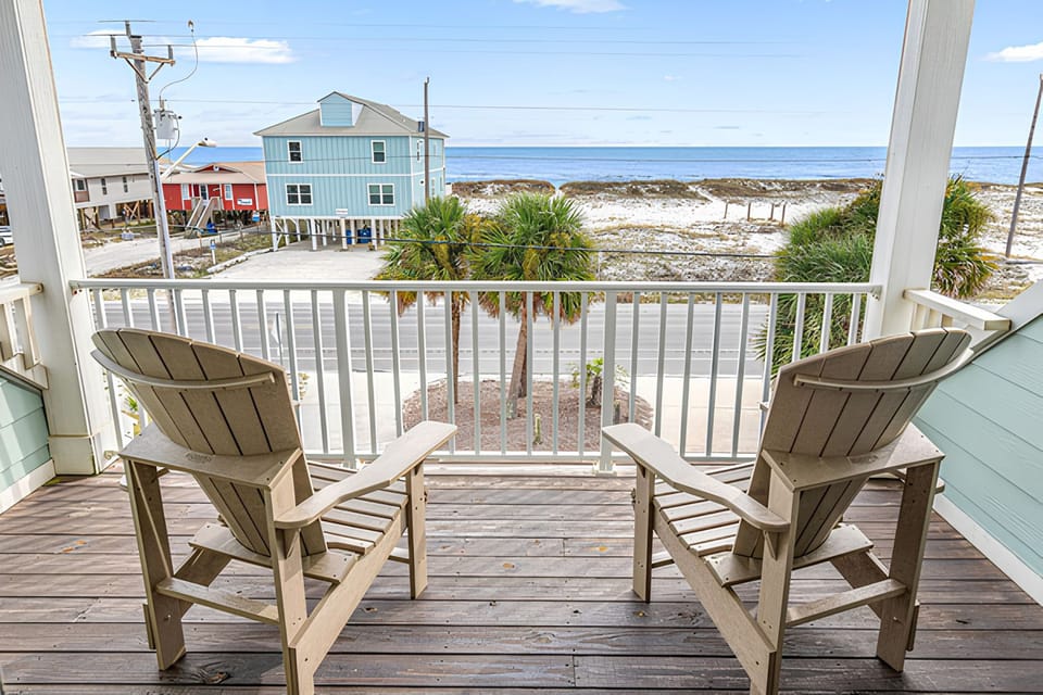 Save a porch chair for sunrise and enjoy the beach across the street.