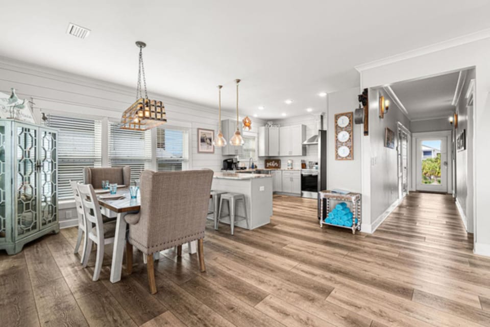 Enjoy a quiet meal in this dining nook with kitchen views.