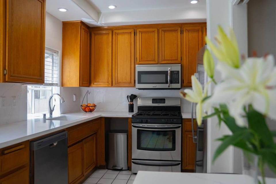 Five-burner gas range and full-size oven, ready for real cooking, not just reheating