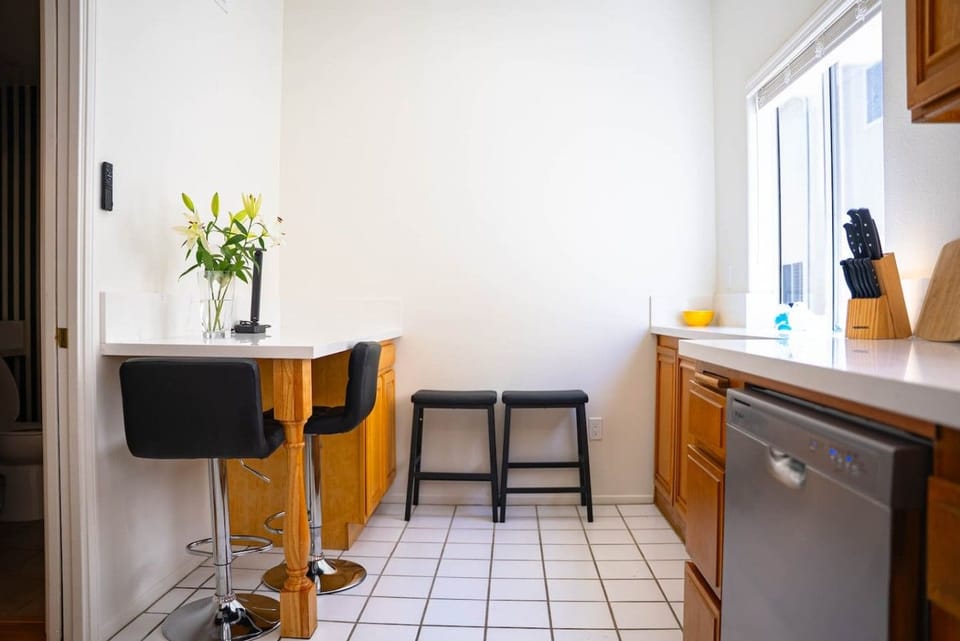 Fully stocked cabinets, cookware, two knife sets, a full flatware service, and a drip coffee maker and kettle for slow mornings
