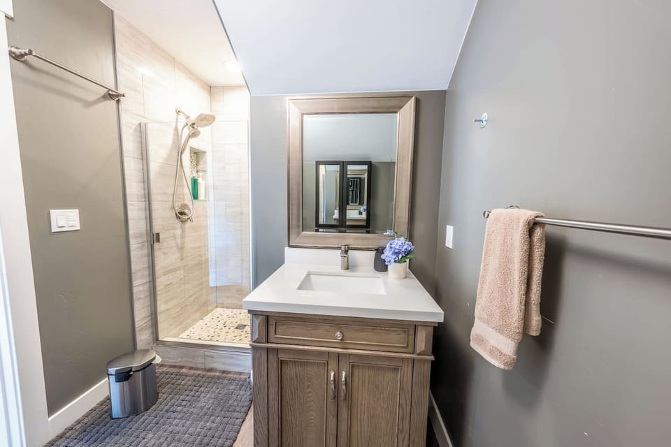 Bathroom with a tiled walk-in shower