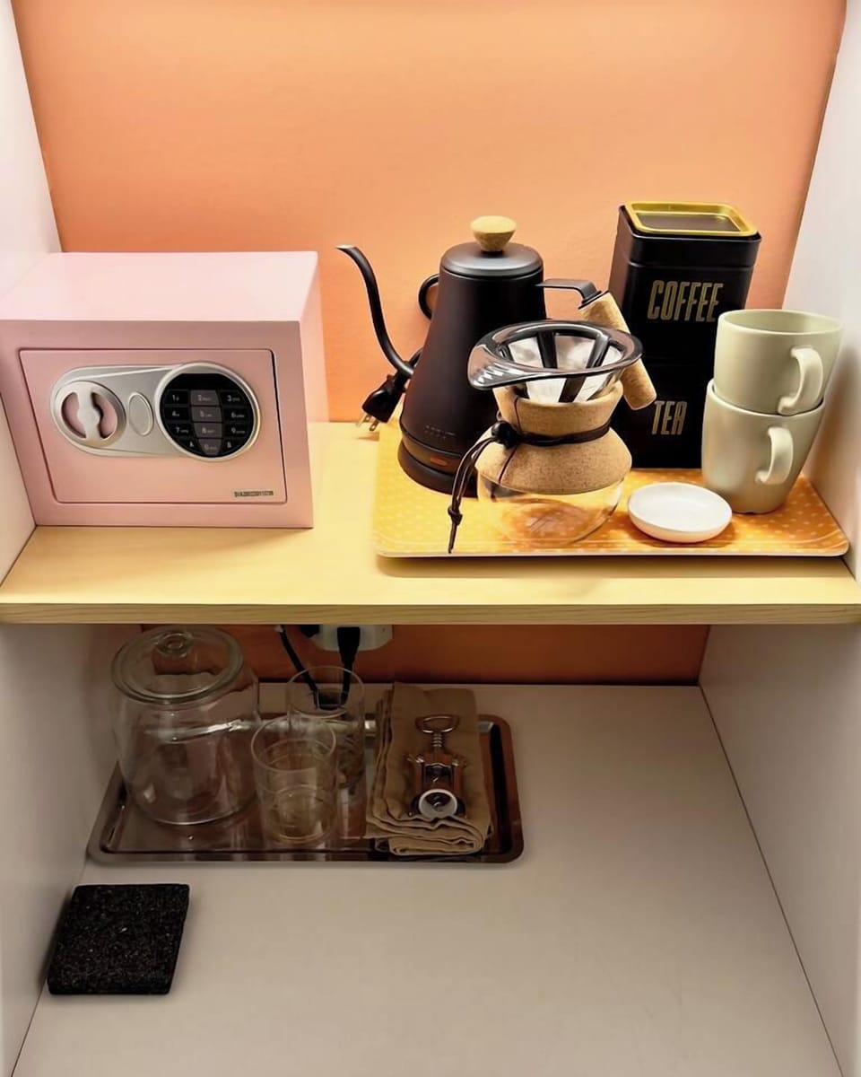 Coffee \ Tea mini fridge in suite.