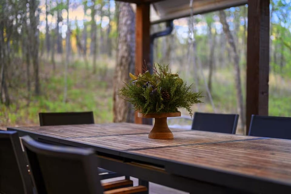 Covered outdoor dining makes family meals even better in the fresh Broken Bow air.