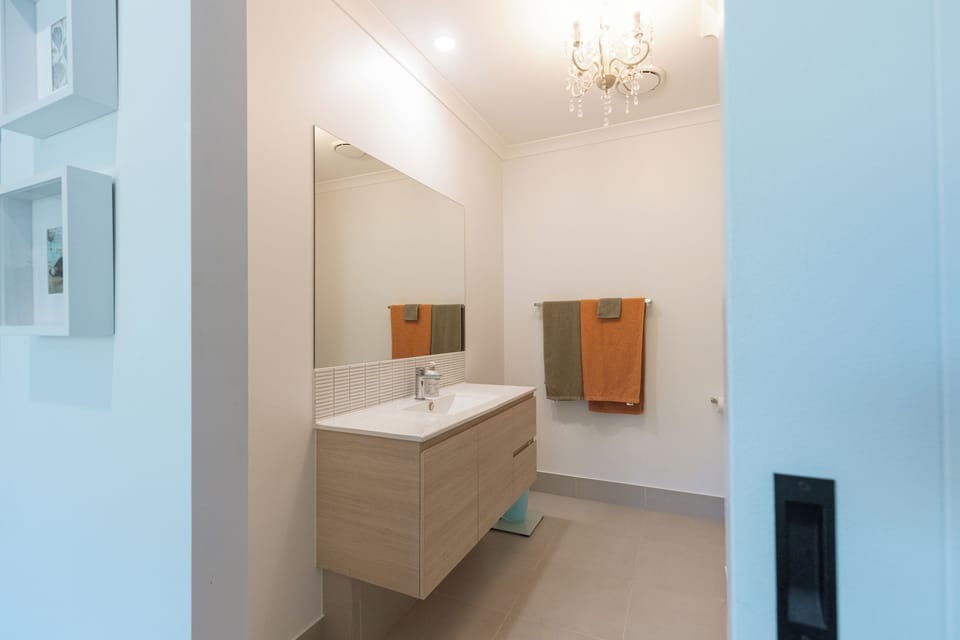 Bright modern bathroom with elegant finishes and stylish vanity