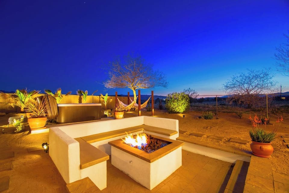 Our Fire Pit with Jacuzzi in the back ground