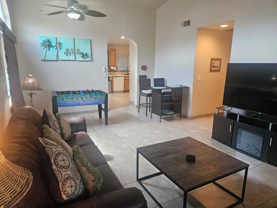 Comfortable living room with plenty of seating for your group.