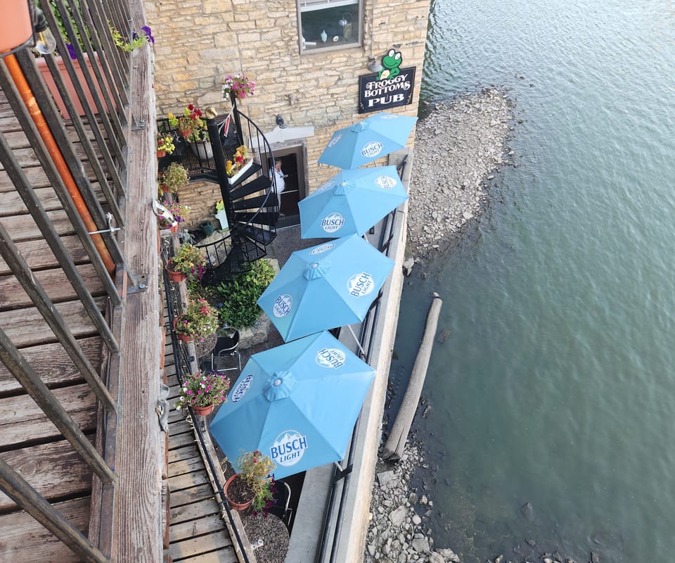 A restaurant and pub patio located just below the Dr Hvisty Suite, offering a perfect outdoor dining experience.