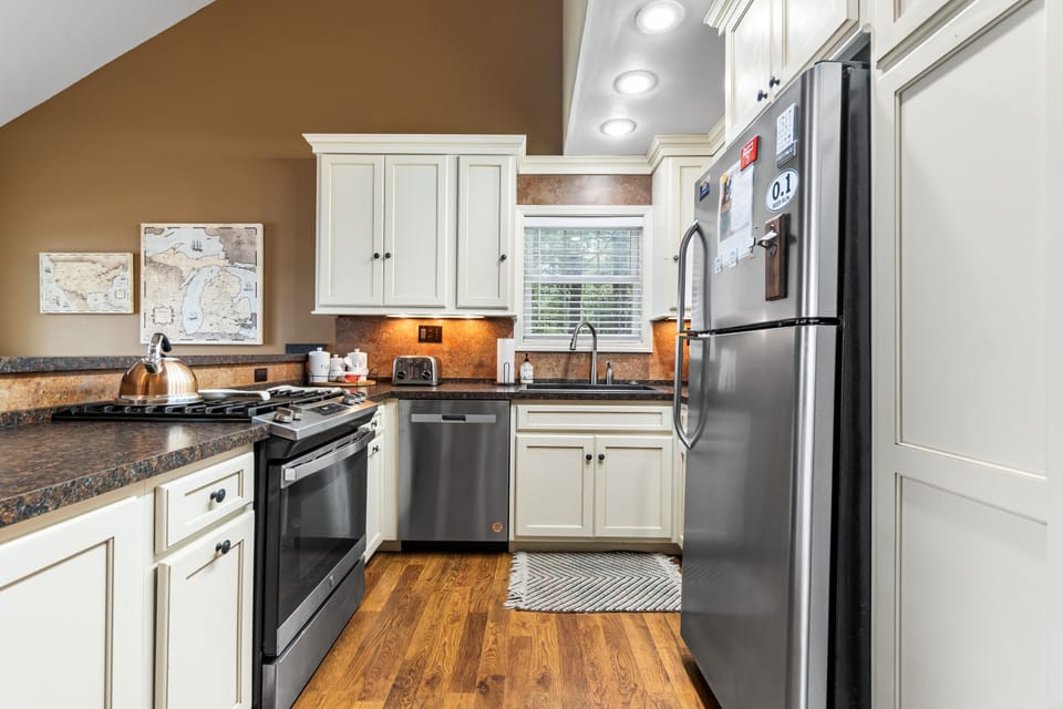 Gas range, full-size fridge and dishwasher