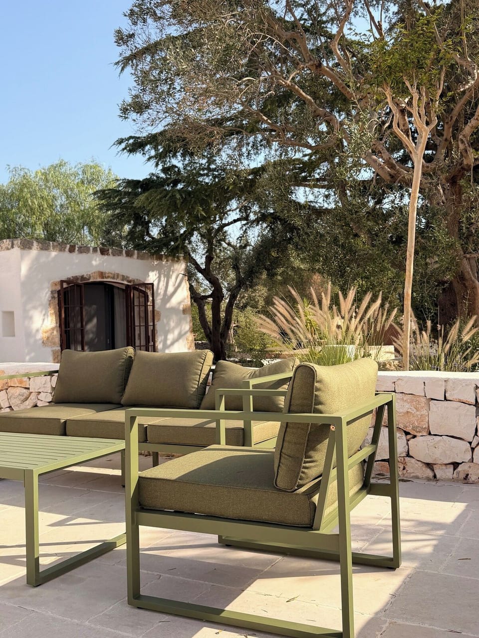 Outdoor lounge sofa and armchairs on the terrace
