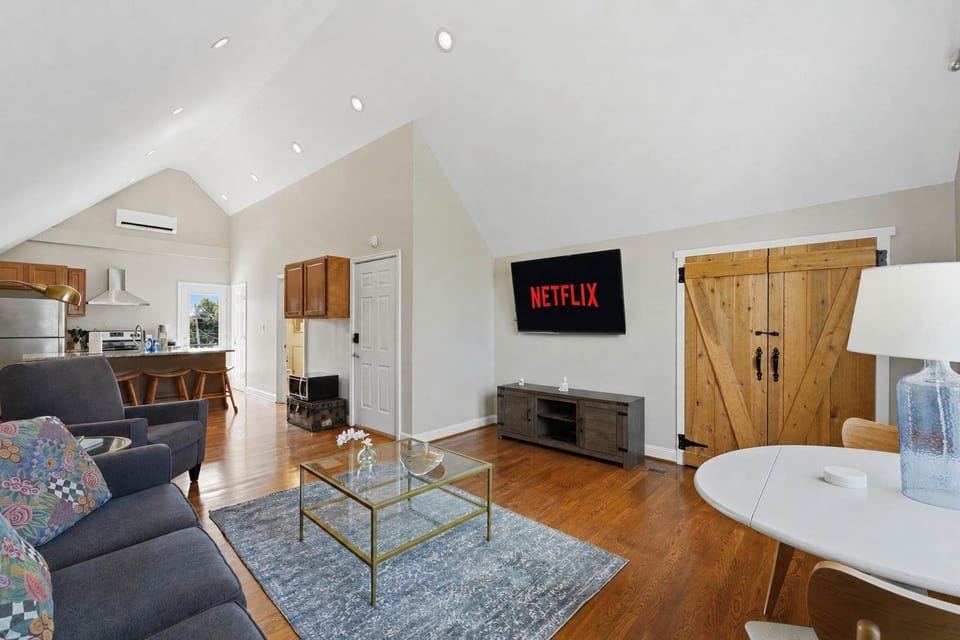 Living Room: Relax in a cozy living room with comfortable seating, warm natural light, and a welcoming layout perfect for unwinding, chatting, or enjoying a quiet night in.