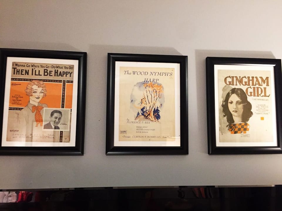 Antique turn of the century song books adorn the walls.