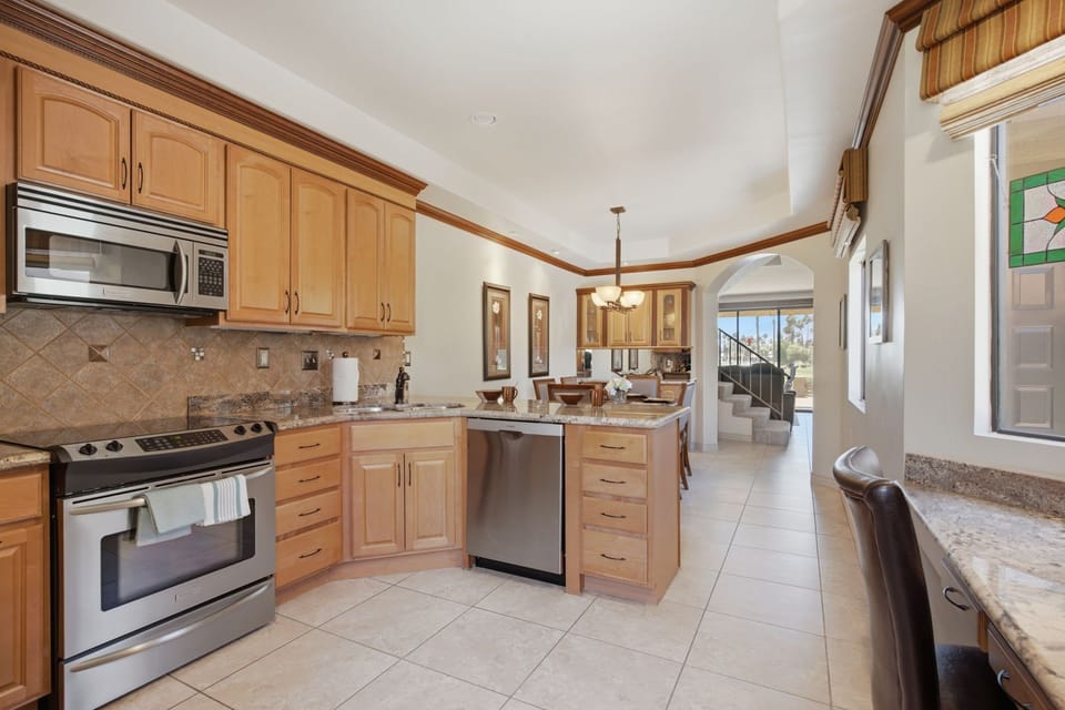 Chef's kitchen equipped for everything from quick breakfasts to gourmet meals.