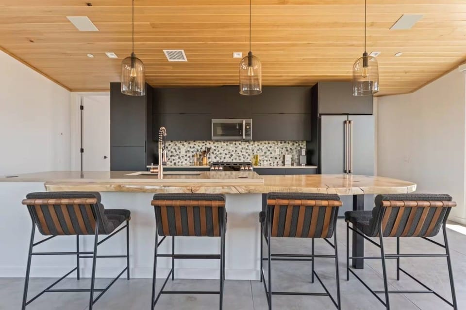 Gather around the spacious kitchen island.
