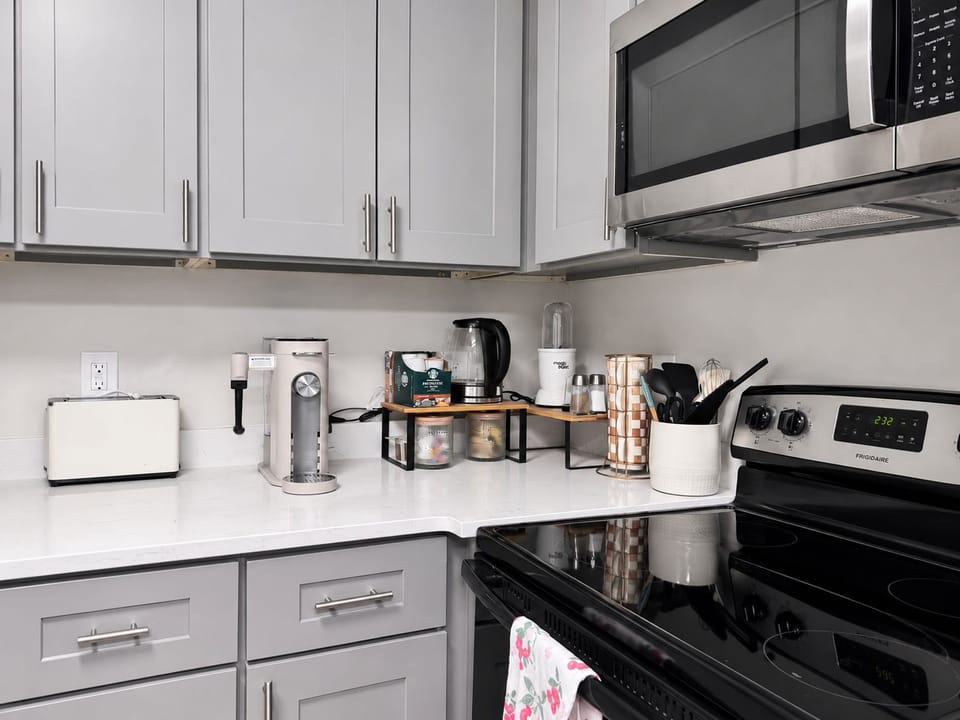 Heat meals in seconds with the integrated overhead microwave oven.