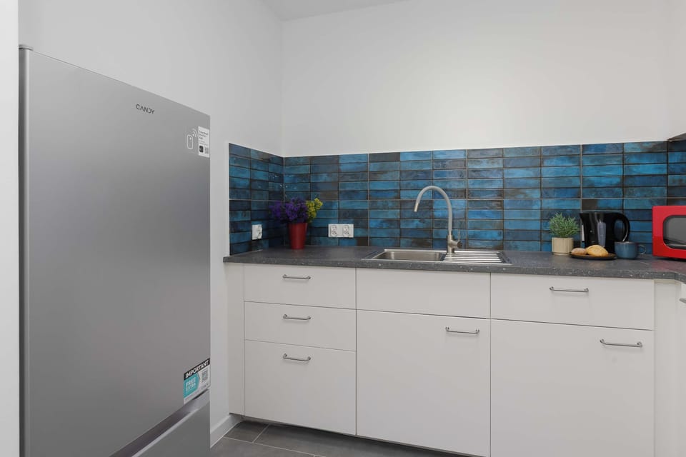 The kitchen's modern appliances make meal preparation easy.