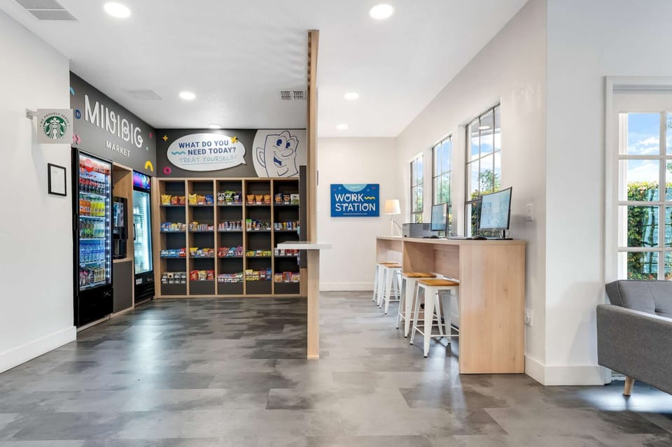 Snack corner and work desks in one bright shared space